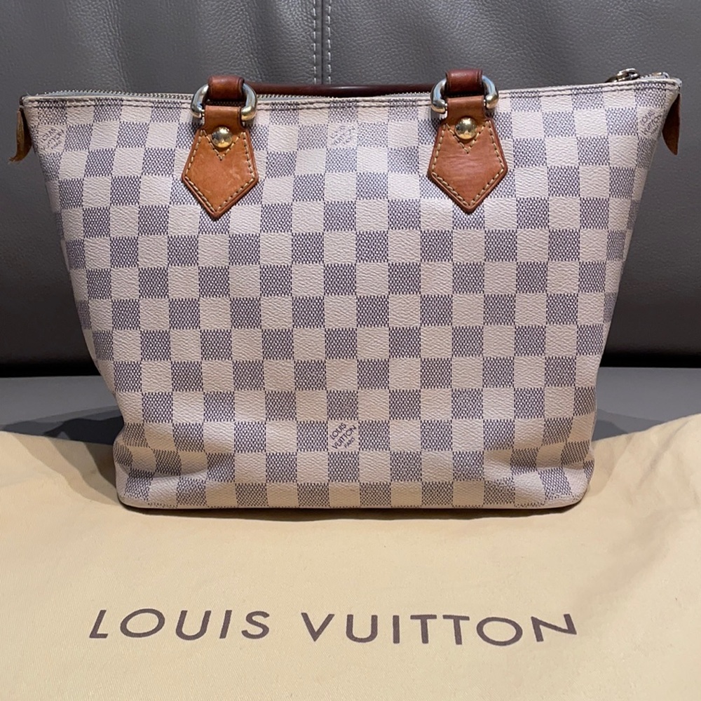 Authentic white Louis Vuitton